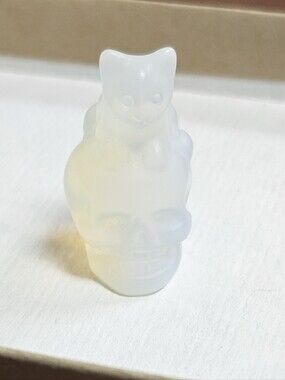 Translucent Opalescent Cat on Skull Figurine